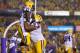 BATON ROUGE, LA - SEPTEMBER 21: Jeremy Hill #33 of the LSU Tigers and Vadal Alexander #78 celebrate after Hill scored a touchdown against the Auburn Tigers at Tiger Stadium on September 21, 2013 in Baton Rouge, Louisiana. (Photo by Chris Graythen/Getty Images)