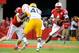 LINCOLN, NE - SEPTEMBER 7: Quarterback Tommy Armstrong Jr. #4 of the Nebraska Cornhuskers runs the ball during their game against the Southern Miss Golden Eagles at Memorial Stadium on September 7, 2013 in Lincoln, Nebraska. Nebraska defeated Southern Miss 56-13. (Photo by Eric Francis/Getty Images)