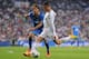 MADRID, SPAIN - SEPTEMBER 22: Cristiano Ronaldo (R) shoots past Pedro Mosquera Getafe during the La Liga match between Real Madrid and Getafe at the Bernabeu on September 22, 2013 in Madrid, Spain. (Photo by Denis Doyle/Getty Images)