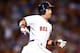 BOSTON, MA - SEPTEMBER 4: Jacoby Ellsbury #2 of the Boston Red Sox runs around first base after hitting a solo home run in the third inning against the Detroit Tigers during the game on September 4, 2013 at Fenway Park in Boston, Massachusetts. (Photo by Jared Wickerham/Getty Images)