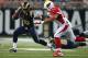ST. LOUIS, MO - SEPTEMBER 8: Daryl Richardson #26 of the St. Louis Rams looks to get past Lorenzo Alexander #97 of the Arizona Cardinals at the Edward Jones Dome on September 8, 2013 in St. Louis, Missouri. The Rams beat the Cardinals 27-24. (Photo by Dilip Vishwanat/Getty Images)