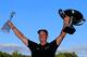 ATLANTA, GA - SEPTEMBER 22: Henrik Stenson of Sweden poses with the TOUR Championship trophy and the FedEx Cup after winning the TOUR Championship and the FedEx Cup playoffs by Coca-Cola at East Lake Golf Club on September 22, 2013 in Atlanta, Georgia. (Photo by Sam Greenwood/Getty Images)