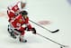 CHICAGO, IL - SEPTEMBER 17: Teuvo Teravainen #23 of the Chicago Blackhawks moves up the ice under pressure from Daniel Alfredsson #11 of the Detroit Red Wings during an exhibition game at United Center on September 17, 2013 in Chicago, Illinois. The Blackhawks defeated the Red Wings 2-0. (Photo by Jonathan Daniel/Getty Images)