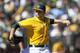 OAKLAND, CA - SEPTEMBER 22: Brett Anderson #49 of the Oakland Athletics pitches against the Minnesota Twins during the sixth inning at O.co Coliseum on September 22, 2013 in Oakland, California. (Photo by Jason O. Watson/Getty Images)