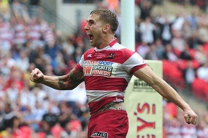 Tomkins Exits Wigan for Record Fee