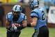 ATLANTA, GA - SEPTEMBER 21: Quarterback Bryn Renner #2 of the North Carolina Tar Heels hands off to tailback Khris Francis #1 during the game against the Georgia Tech Yellow Jackets at Bobby Dodd Stadium at Historic Grant Field on September 21, 2013 in Atlanta, Georgia. (Photo by Mike Zarrilli/Getty Images)
