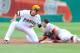 PITTSBURGH, PA - SEPTEMBER 22: Billy Hamilton #6 of the Cincinnati Reds safely steals second base in front of Neil Walker #18 of the Pittsburgh Pirates during the second inning on September 22, 2013 at PNC Park in Pittsburgh, Pennsylvania. (Photo by Joe Sargent/Getty Images)