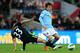 LONDON, ENGLAND - MAY 11: David Silva of Manchester City is tackled by Paul Scharner of Wigan Athletic during the FA Cup with Budweiser Final between Manchester City and Wigan Athletic at Wembley Stadium on May 11, 2013 in London, England. (Photo by Alex Livesey/Getty Images)