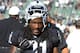 Raiders cornerback Mike Jenkins looks to shut down some of the Broncos' receivers.