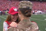 Army Captain Surprises Daughter at UW Game