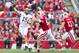 Sep 21, 2013; Madison, WI, USA; Purdue Boilermakers quarterback Rob Henry (15) throws a pass as Wisconsin Badgers defensive end Tyler Dippel (51) defends during the first quarter at Camp Randall Stadium. Mandatory Credit: Jeff Hanisch-USA TODAY Sports