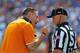 GAINESVILLE, FL - SEPTEMBER 21: Coach Butch Jones of the Tennessee Volunteers questions side judge Chris Conley about a fumble in the 1st quarter against the Florida Gators September 21, 2013 at Ben Hill Griffin Stadium at Florida Field in Gainesville, Florida. The Gators won 31 - 17. (Photo by Al Messerschmidt/Getty Images)
