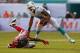 MIAMI GARDENS, FL - SEPTEMBER 22: Rishard Matthews #18 of the Miami Dolphins evades a tackle from Robert McClain #27 of the Atlanta Falcons during a game at Sun Life Stadium on September 22, 2013 in Miami Gardens, Florida. (Photo by Mike Ehrmann/Getty Images)
