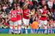 LONDON, ENGLAND - SEPTEMBER 22: Aaron Ramsey (C) of Arsenal celebrates scoring during the Barclays Premier League match between Arsenal and Stoke City at Emirates Stadium on September 22, 2013 in London, England. (Photo by Ian Walton/Getty Images)