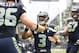 Sep 22, 2013; Seattle, WA, USA; Seattle Seahawks quarterback Russell Wilson (3) celebrates with tight end Zach Miller (86) after a touchdown against the Jacksonville Jaguars during the first quarter at CenturyLink Field. Mandatory Credit: Joe Nicholson-USA TODAY Sports