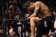 Jan 26, 2013; Chicago, IL, USA; Anthony Pettis kneels before his fight against Donald Cerrone (not pictured) during UFC on FOX 6 at the United Center. Mandatory Credit: David Banks-USA TODAY Sports