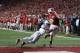 MADISON, WI - NOVEMBER 17: Derek Watt #34 of the Wisconsin Badgers makes the catch but is quickly hit by Bradley Roby #1 of the Ohio State Buckeyes which ended in a incomplete pass during the game at Camp Randall Stadium on November 17, 2012 in Madison, Wisconsin. (Photo by Mike McGinnis/Getty Images)