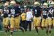 SOUTH BEND, IN - SEPTEMBER 21: Head coach Brian Kelly of the Notre Dame Fighting Irish (center) moves onto the field with his team before taking on the Michigan State Spartans at Notre Dame Stadium on September 21, 2013 in South Bend, Indiana. Notre Dame defeated Michigan State 17-13. (Photo by Jonathan Daniel/Getty Images)