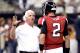 Sep 8, 2013; New Orleans, LA, USA; Atlanta Falcons head coach Mike Smith talks with quarterback Matt Ryan (2) before their game against the New Orleans Saints at the Mercedes-Benz Superdome. Mandatory Credit: John David Mercer-USA TODAY Sports
