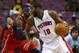 Josh Smith and Greg Monroe are now teammates in Detroit.
