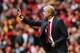 LONDON, ENGLAND - SEPTEMBER 22: Arsene Wenger manager of Arsenal gives instructions during the Barclays Premier League match between Arsenal and Stoke City at Emirates Stadium on September 22, 2013 in London, England. (Photo by Ian Walton/Getty Images)