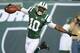 EAST RUTHERFORD, NJ - SEPTEMBER 22: Wide receiver Santonio Holmes #10 of the New York Jets celebrates after his 69 yard touchdown catch in the 2nd half of the Jets 27-20 win over the Buffalo Bills at MetLife Stadium on September 22, 2013 in East Rutherford, New Jersey. (Photo by Ron Antonelli/Getty Images)