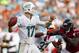Sep 22, 2013; Miami Gardens, FL, USA; Miami Dolphins quarterback Ryan Tannehill (17) drops back to pass but is sacked by Atlanta Falcons middle linebacker Akeem Dent (52) in the second half at Sun Life Stadium. Miami won 27-23. Mandatory Credit: Robert Mayer-USA TODAY Sports