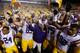 BATON ROUGE, LA - SEPTEMBER 21: Head coach Les Miles of the LSU Tigers celebrates with his team after defeating the Auburn Tigers 35-21 at Tiger Stadium on September 21, 2013 in Baton Rouge, Louisiana. (Photo by Chris Graythen/Getty Images)