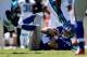 CHARLOTTE, NC - SEPTEMBER 22: Eli Manning #10 of the New York Giants is knocked to the ground during their game against the Carolina Panthers at Bank of America Stadium on September 22, 2013 in Charlotte, North Carolina. (Photo by Streeter Lecka/Getty Images)