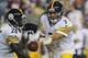 Aug 19, 2013; Landover, MD, USA; Pittsburgh Steelers quarterback Ben Roethlisberger (7) hands the ball off to Pittsburgh Steelers running back Le'Veon Bell (26) during the first half against the Washington Redskins at FedEX Field. Mandatory Credit: Brad Mills-USA TODAY Sports