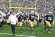 Sep 21, 2013; South Bend, IN, USA; Notre Dame Fighting Irish coach Brian Kelly leads his team onto the field before the game against the Michigan State Spartans at Notre Dame Stadium. Mandatory Credit: Brian Spurlock-USA TODAY Sports