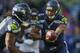 SEATTLE, WA - SEPTEMBER 22: Quarterback Russell Wilson #3 of the Seattle Seahawks hands off to running back Marshawn Lynch #24 against the Jacksonville Jaguars at CenturyLink Field on September 22, 2013 in Seattle, Washington. (Photo by Otto Greule Jr/Getty Images)