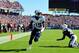 Sep 22, 2013; Nashville, TN, USA; Tennessee Titans wide receiver Justin Hunter (15) scores the winning touchdown against San Diego Chargers cornerback Crezdon Butler (20) during the second half at LP Field. The Titans beat the Chargers 20-17. Mandatory Credit: Don McPeak-USA TODAY Sports