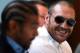 LONDON, ENGLAND - JULY 11: Tyson Fury (R) speaks beside David Haye during a press conference to announce their upcoming title fight on July 11, 2013 in London, England. (Photo by Clive Rose/Getty Images)
