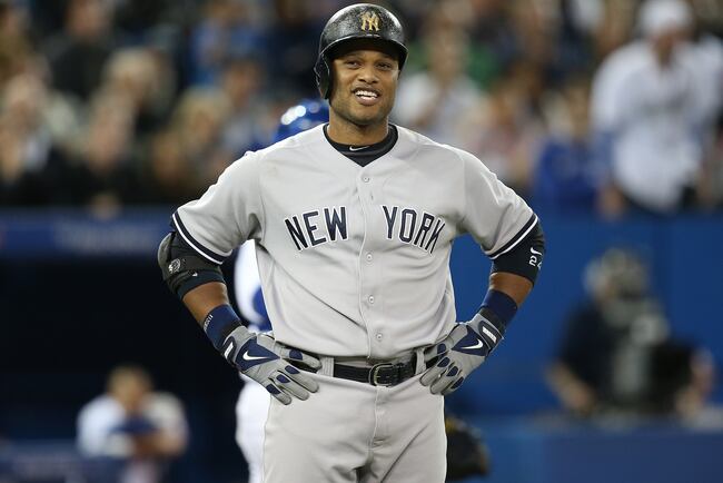 Hi-res-180980125-robinson-cano-of-the-new-york-yankees-reacts-after-his_crop_north