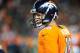 Sep 23, 2013; Denver, CO, USA; Denver Broncos quarterback Peyton Manning (18) during the second half against the Oakland Raiders at Sports Authority Field at Mile High. The Broncos won 37-21. Mandatory Credit: Chris Humphreys-USA TODAY Sports
