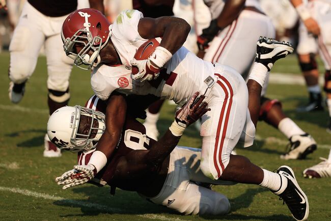 Hi-res-180581247-yeldon-of-the-alabama-crimson-tide-runs-against-steven_crop_north