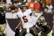 Sep 15, 2013; Tampa, FL, USA; Tampa Bay Buccaneers quarterback Josh Freeman (5) sets to throw during the second half of the game against the New Orleans Saints at Raymond James Stadium. Mandatory Credit: Rob Foldy-USA TODAY Sports