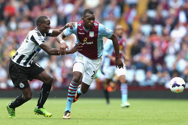 Hi-res-180533933-christian-benteke-of-aston-villa-tangles-with-mapou_crop_north