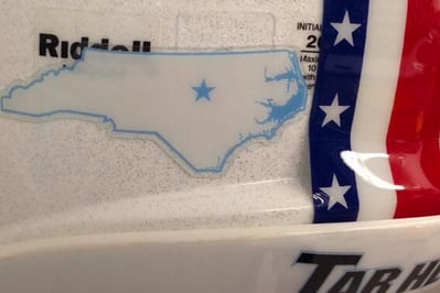 Photo: UNC Adds New “Tar Heel State” Decal to Back of Football Helmets