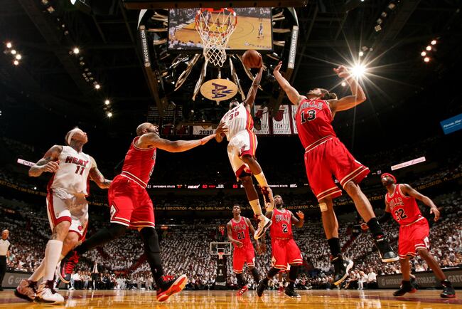 Hi-res-168828772-norris-cole-of-the-miami-heat-dunks-against-joakim-noah_crop_north