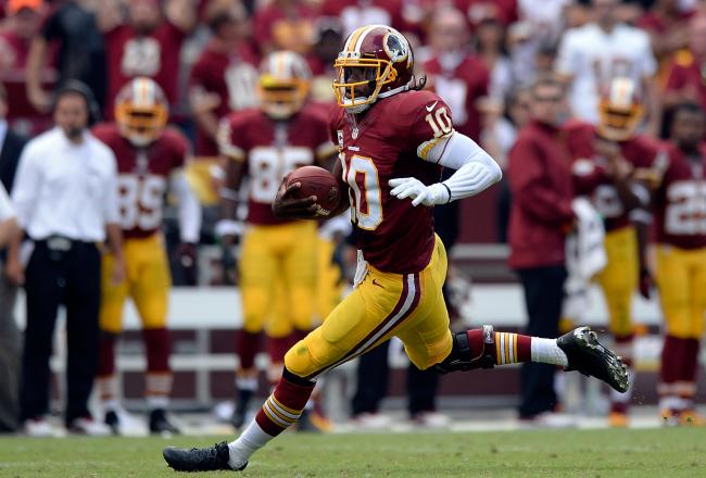 Hi-res-181574030-robert-griffin-iii-of-the-washington-redskins-scrambles_crop_north