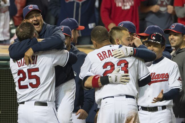 Hi-res-181761721-jason-giambi-celebrates-with-manager-terry-francona-of_crop_north