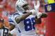 KANSAS CITY, MO - SEPTEMBER 15: Dez Bryant #88 of the Dallas Cowboys celebrates after scoring a touchdown against the Kansas City Chiefs in the first quarter September 15, 2013 at Arrowhead Stadium in Kansas City, Missouri. (Photo by Kyle Rivas/Getty Images)