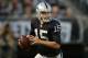 Aug 23, 2013; Oakland, CA, USA; Oakland Raiders quarterback Matt Flynn (15) throws a pass against the Chicago Bears at O.co Coliseum. Mandatory Credit: Kirby Lee-USA TODAY Sports