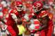 KANSAS CITY, MO - SEPTEMBER 15: Alex Smith #11 hands off to Jamaal Charles #25 of the Kansas City Chiefs in an attempt to run down the clock at the end of the game against the Dallas Cowboys in the fourth quarter on September 15, 2013 at Arrowhead Stadium in Kansas City, Missouri. (Photo by Kyle Rivas/Getty Images)