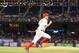 ARLINGTON, TX - SEPTEMBER 26: Ian Kinsler #5 of the Texas Rangers scores against the Los Angeles Angels in the first inning at Rangers Ballpark in Arlington on September 26, 2013 in Arlington, Texas. (Photo by Ronald Martinez/Getty Images)