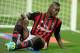 MILAN, ITALY - SEPTEMBER 22: Mario Balotelli of AC Milan appears dejected during the Serie A match between AC Milan and SSC Napoli at San Siro Stadium on September 22, 2013 in Milan, Italy. (Photo by Claudio Villa/Getty Images)