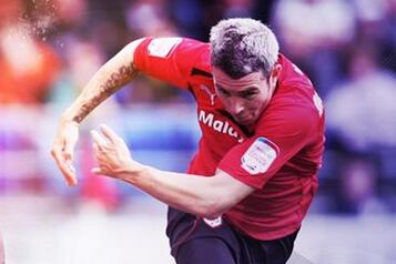 Cardiff's McNaughton Joins Bolton on Emergency Loan