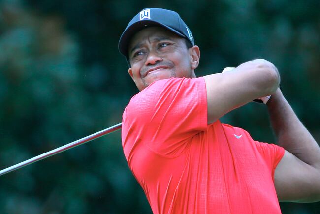 Hi-res-181548704-tiger-woods-watches-his-tee-shot-on-the-fifth-hole_crop_north